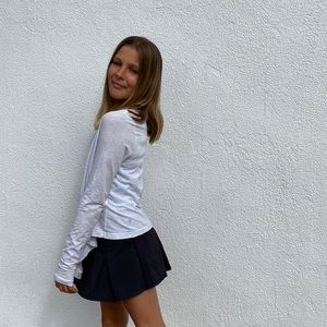 Off-white Iviva cardigan with thumb holes.